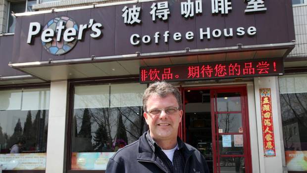 Kevin Garratt outside his coffee shop in Dandong, Liaoning, China.