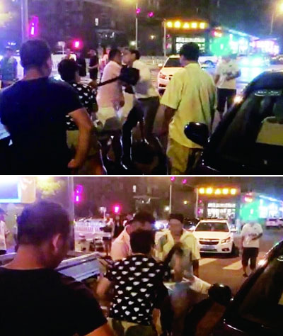 BMW driver beats foreigner with belt in Beijing