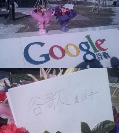Well-wishers leave flowers at Google China HQ earlier today