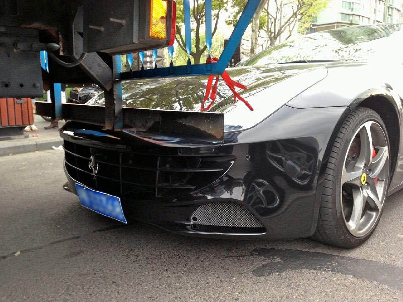 Ferrari accident in Shanghai bike lane. Photo by Chiprdan.
